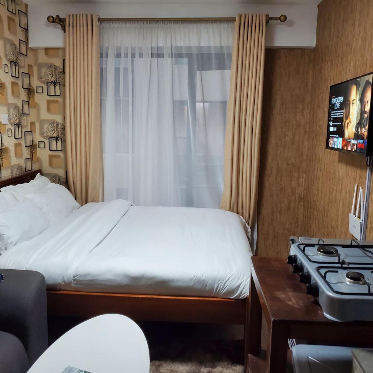 Ferienwohnung Lovely & Cozy Compact Studio Near Airport With Rooftop View Nairobi Exterior foto